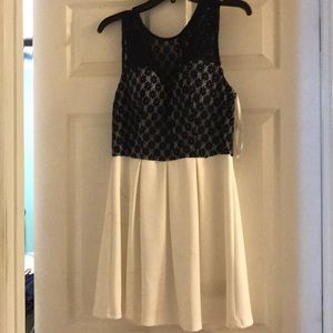 Short navy and white dress.